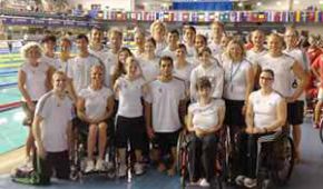 Athleten und Athletinnen auf einem Gruppenfoto