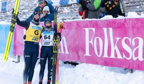 Linn Kazmaier mit Guide Florian Baumann und den deutschen Fans